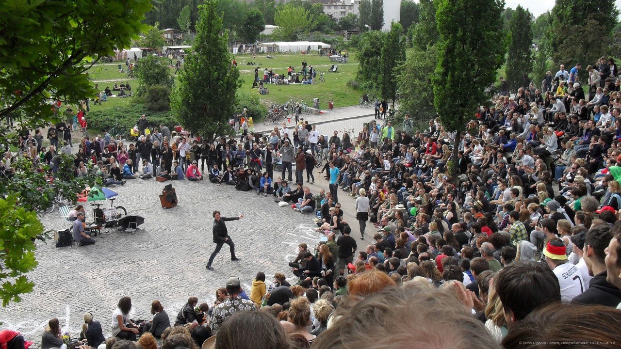 Visit the Flea market and karaoke in Mauerpark in Berlin.